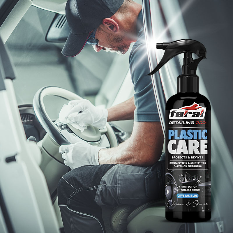 Rear view of a young man using detergent for and microfiber clot